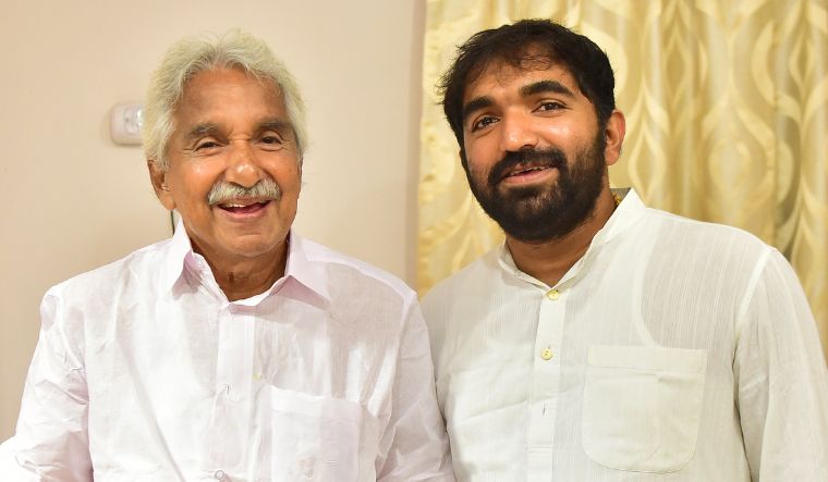 Oommen Chandy with son Chandy Oommen